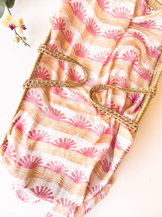 Organic Pink Sun + Wave Baby Swaddle | Coastal Nursery Decor